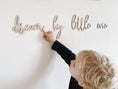Load image into Gallery viewer, Wanddeko Kinderzimmer, Wohndeko "dream big little one", 3D Schriftzug aus Holz, Geschenk zur Geburt