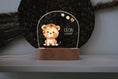 Load image into Gallery viewer, Nachtlicht "Löwe" personalisiert aus Acryl, Holzfuß mit zusätzlicher Gravur, die Geschenkidee zur Geburt, Taufe oder fürs Kinderzimmer