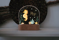 Load image into Gallery viewer, Nachtlicht "Seepferd" personalisiert aus Acryl, Holzfuß Gravur, Babygeschenk Geburt, Kinderzimmer, Persönliches Geburtstagsgeschenk, Taufe

